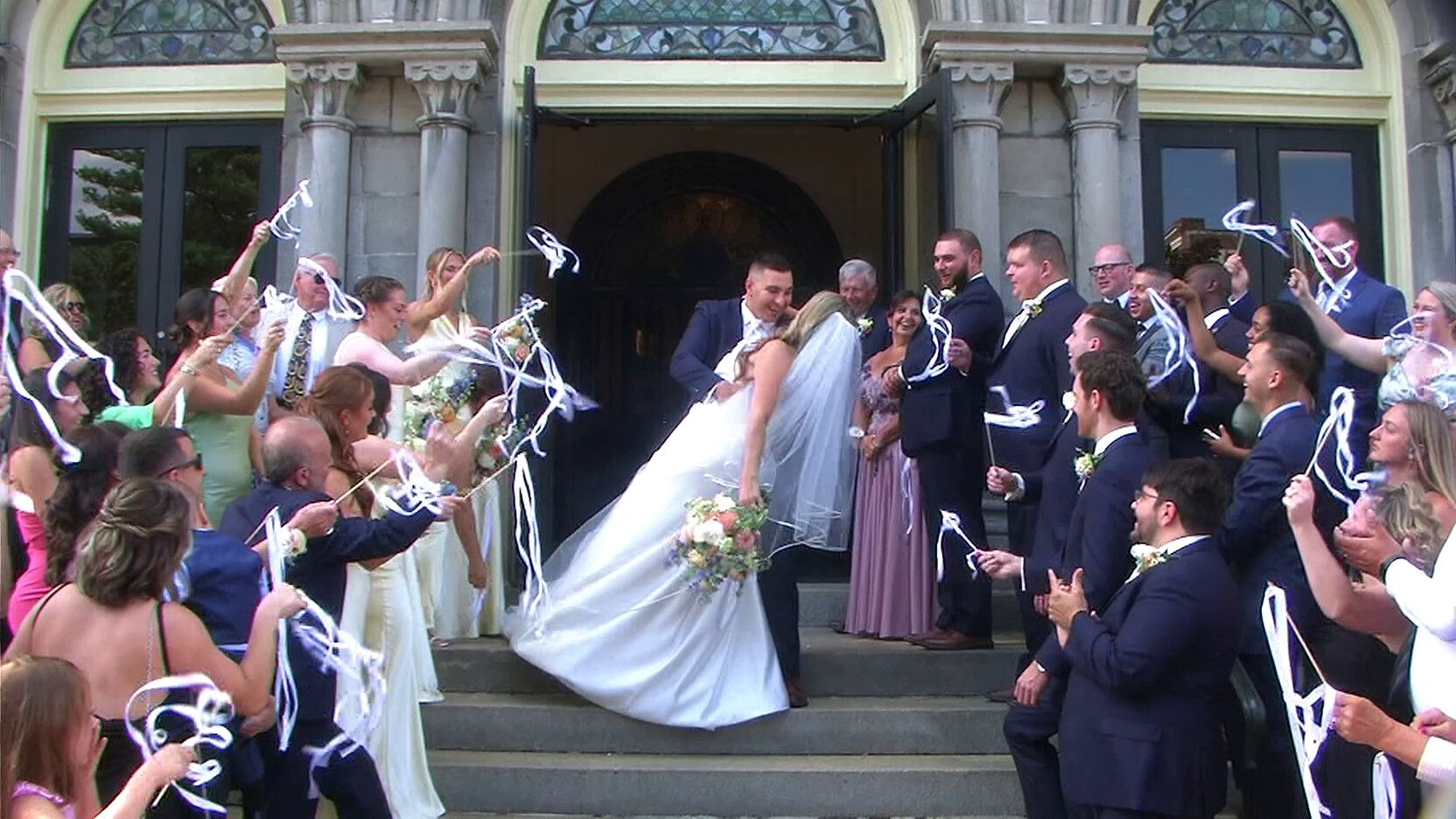 Wedding recessional through raised ribbon wands, filmed on a JVC 3CCD vintage camcorder