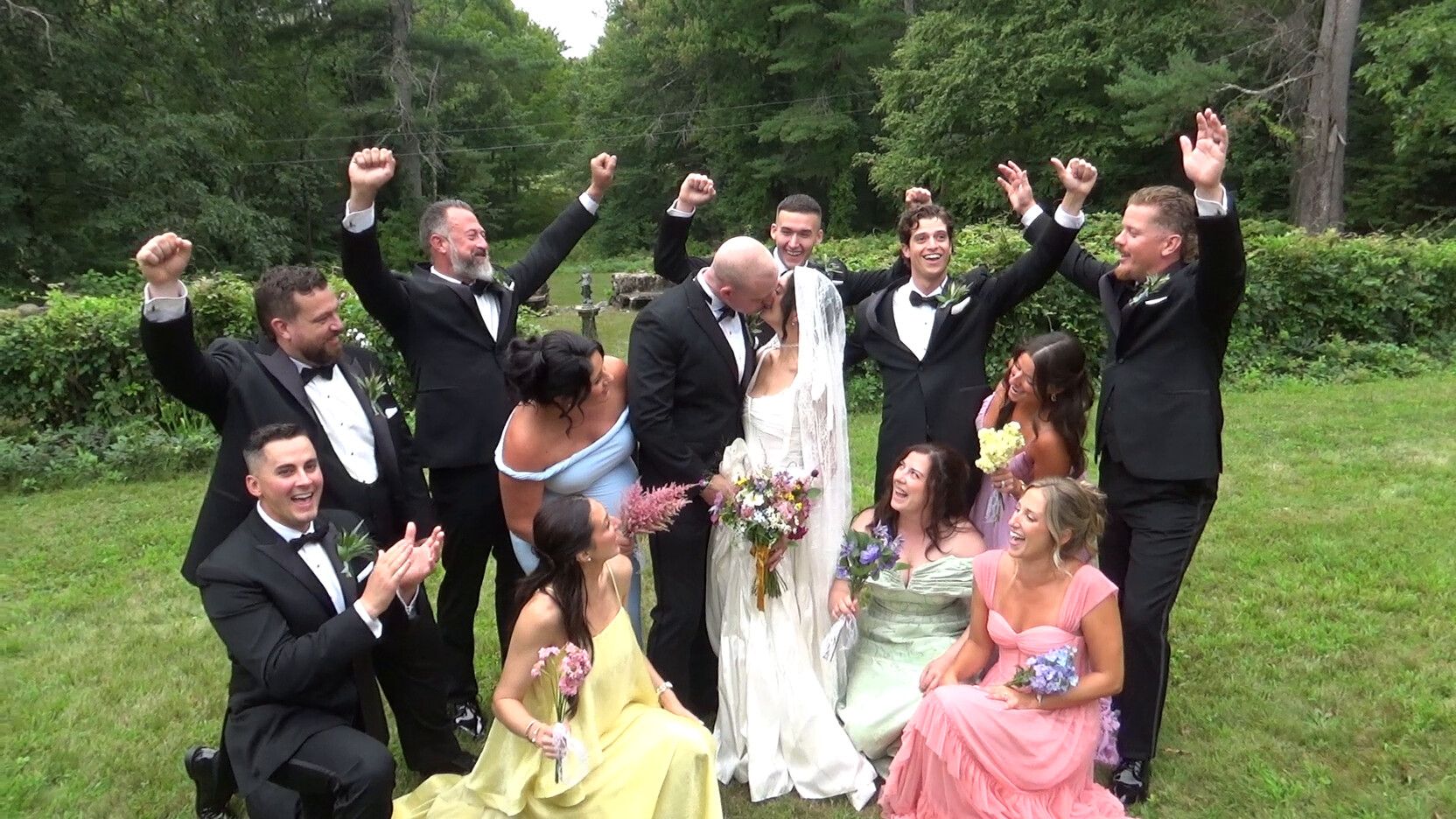 Wedding party cheering outdoors, filmed on a Sony Handycam camcorder rental
