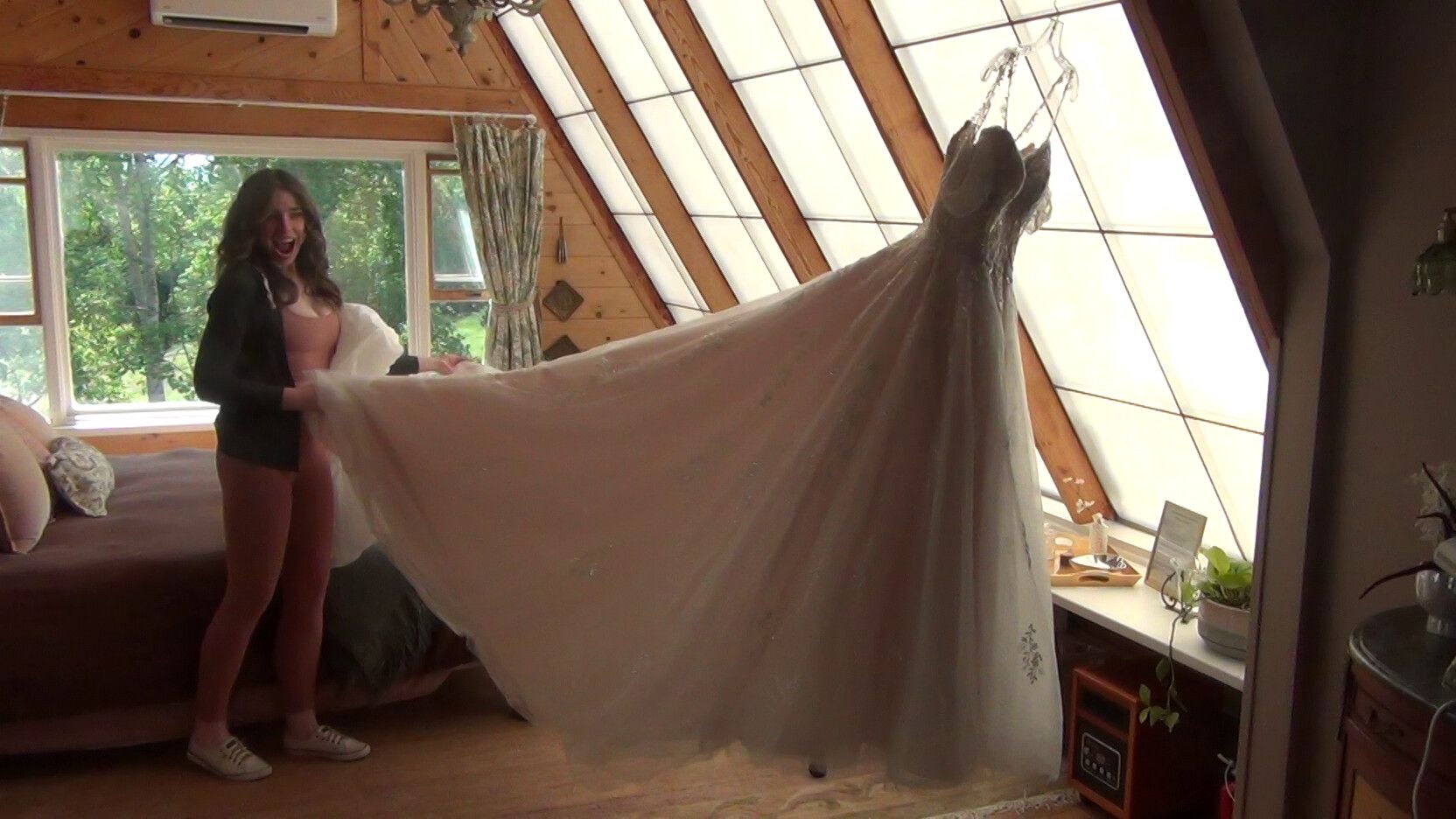 Wedding veil spread out in morning light, filmed on a Sony HDR-CX130 Handycam rental